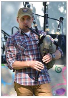 Me piping @ the Highlandia Music Festival in our Highlands neighbourhood, June 21, 2014.