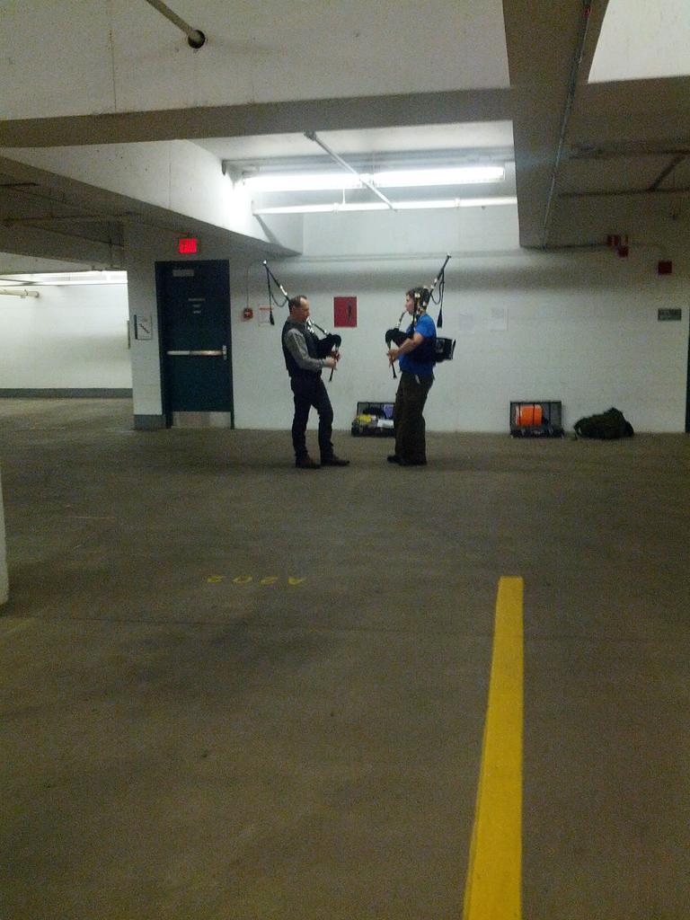Practicing in the MacEwan University Parking garage with my attentive instructor, Dallas; she does no put up with crap playing!